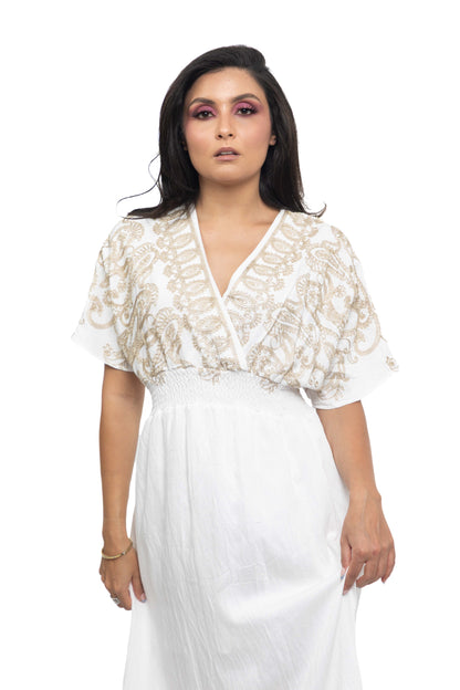 Robe longue à broderies arabesques